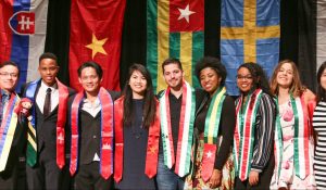 International seniors receiving sash at banquet